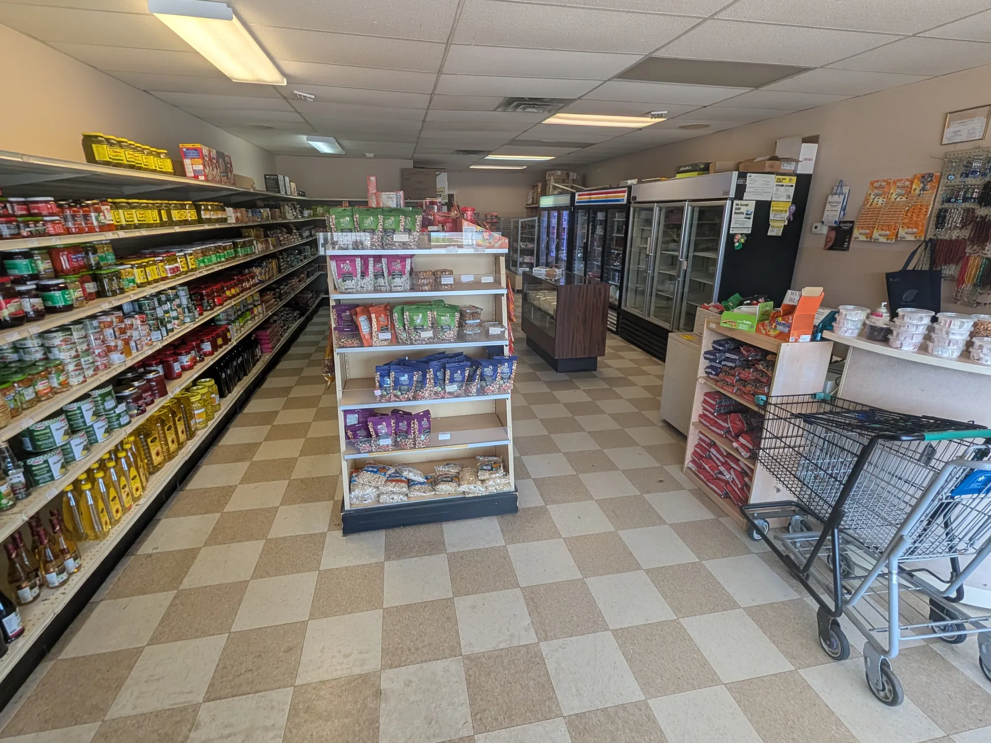 Inside Yener Turkish Food Market in Toms River, showing stocked grocery aisles